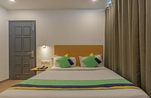 Ahmedabad Hotel | FabHotels Ny Townhouse