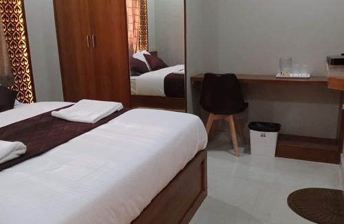 Madiwala Hotel | Olivia Inn And Suites