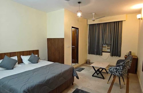 South Extension Hotel | The Grey Leaf Residency