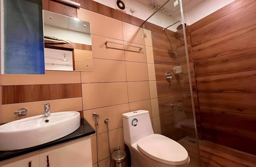 Thankamony part Hotel | Skybz Bluemount Residency