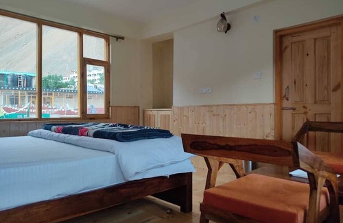 Kaza Hotel | The old monk