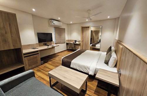 New Town Hotel | FIRANGIPANI SUITES