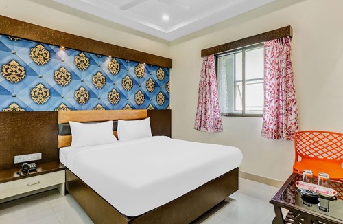 Nerul Hotel | Capital O Hotel Geeta Palace