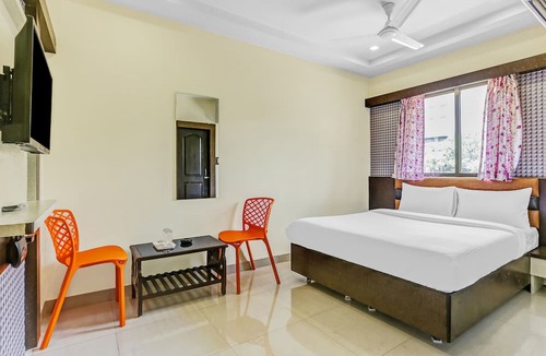 Nerul Hotel | Capital O Hotel Geeta Palace