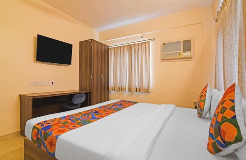 New Town Hotel | FabHotel The Bliss, Nr - Bisarjan Ghat
