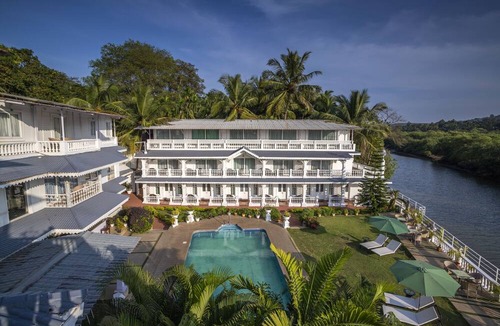Kudal Hotel | Stone Wood River Front