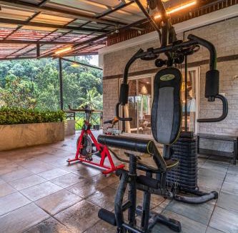Kunchithanny Villa | ELIVAAS Signature Kavyath Valley 4-BHK Villa With Scenic Mountain View , Private Outdoor Pool, Gym And In-House Tea Garden