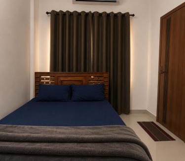 Kozhikode House | lQ Rooms