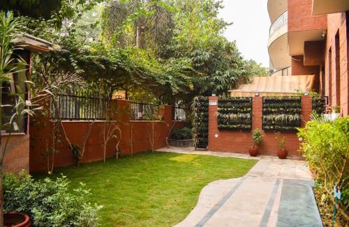 DLF City Hotel | Firebrick Boutique Residences - GARNET HOUSE