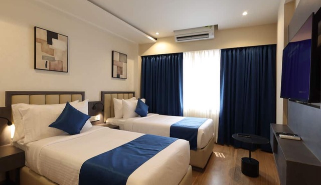 Grand Plaza Inn by RAK Rooms Kannur