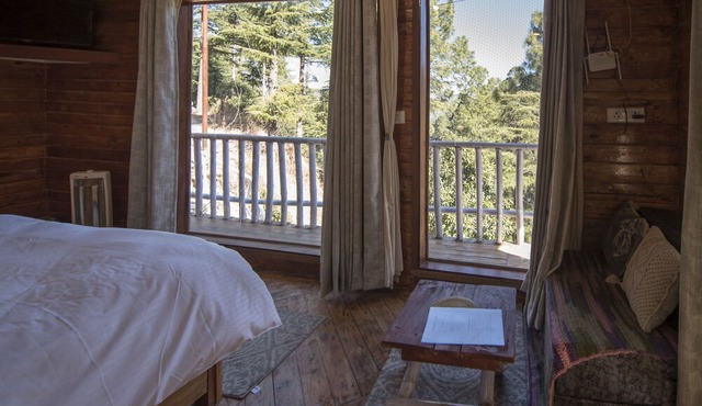 Kaath Maati-Luxurious woodem two storied Treehouse in the lap of nature