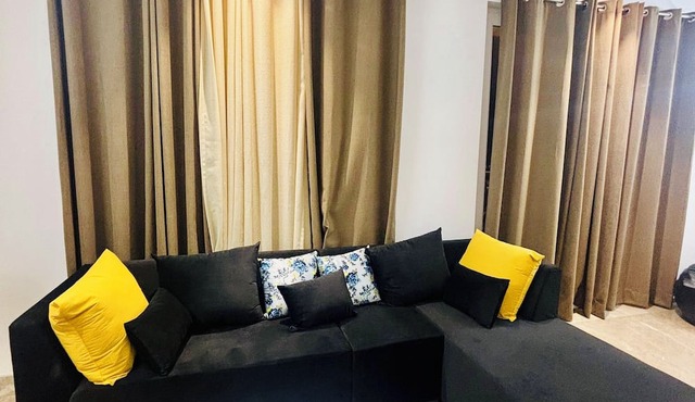Cozy 2-bedroom apartment with AC in serene Noida