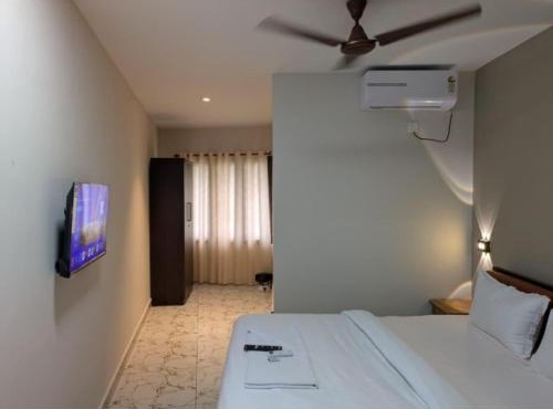 Hotel Vista by Booksy One Kollam Near Kollam Bypass