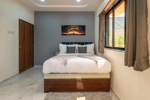Alaya Stays Ansh Villa Luxury 4-BHK Pet-friendly Getaway with Private Pool, Lawn & Sports Turf Near Solanpada Dam & Sahyadri Waterfall